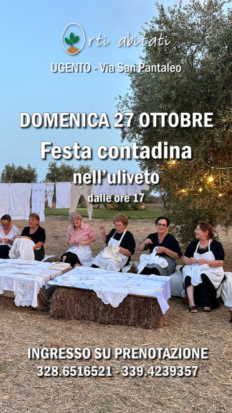 Festa contadina con figuranti in costume nell'uliveto