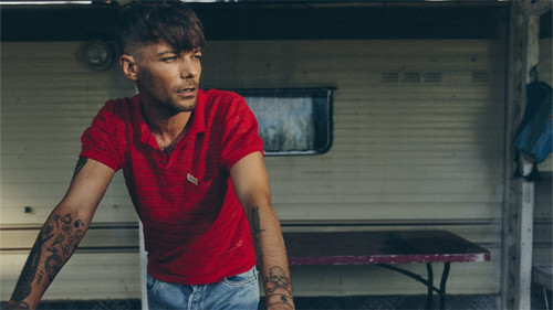 Louis Tomlinson arriva in Italia